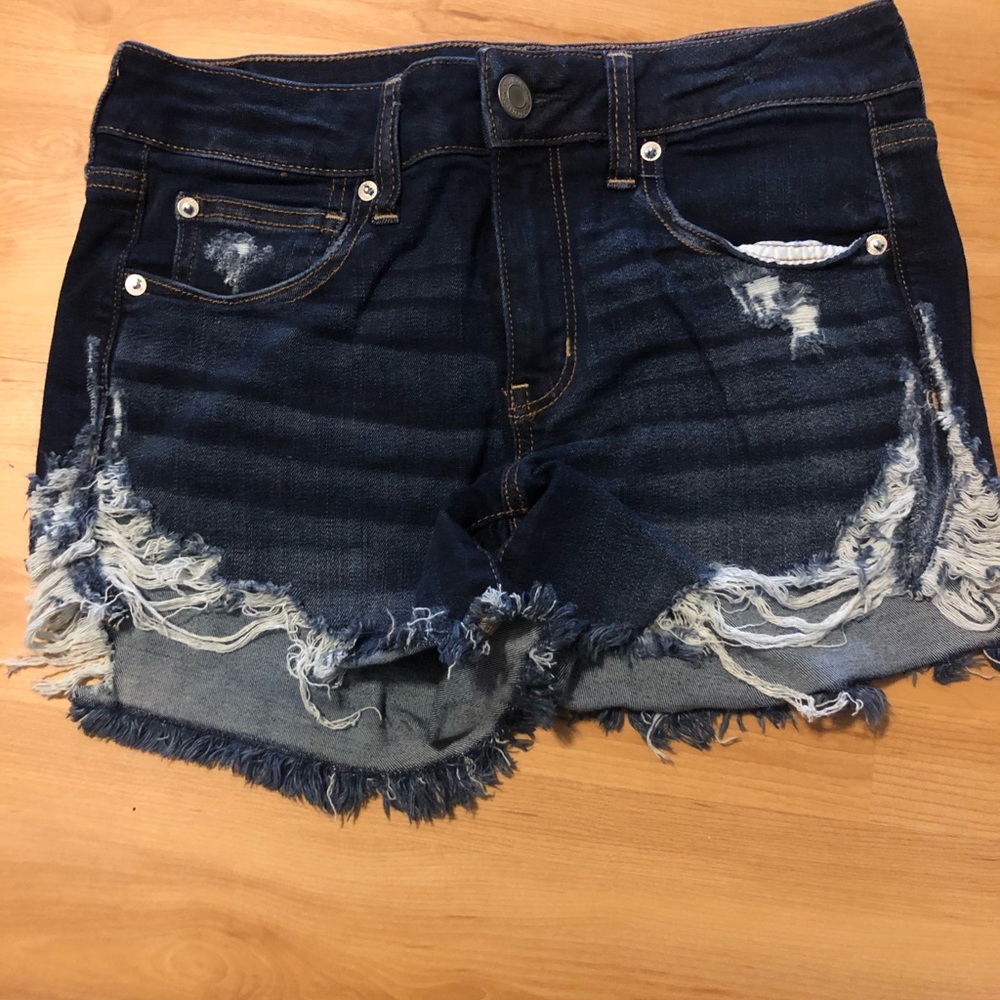 American Eagle destroyed dark denim midis size 8